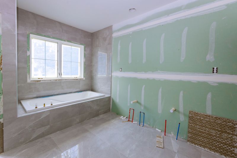 Installing Bathtub in a Modern Bathroom